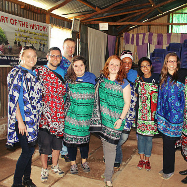 volunteer with locals in Kenya