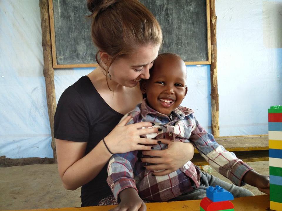 volunteer with kids in Tanzania