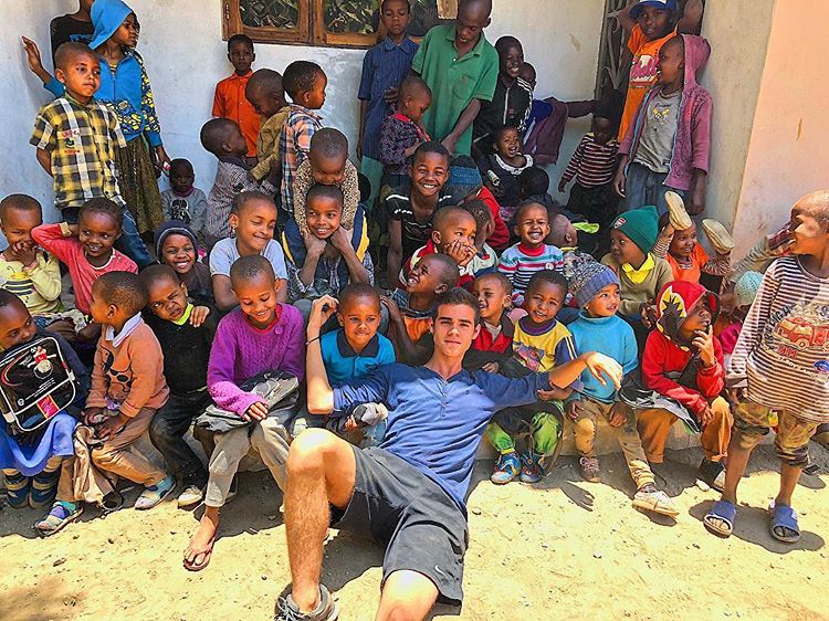 volunteer with kids in tanzania
