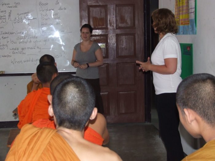 volunteers teaching in class