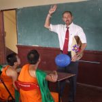 man teaching in classroom