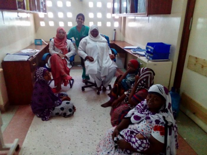 medical volunteer with locals