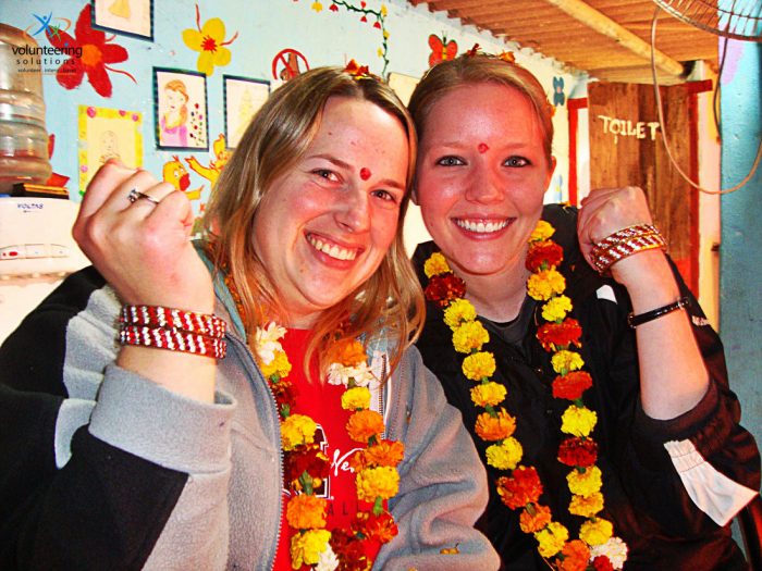 women volunteers smiling