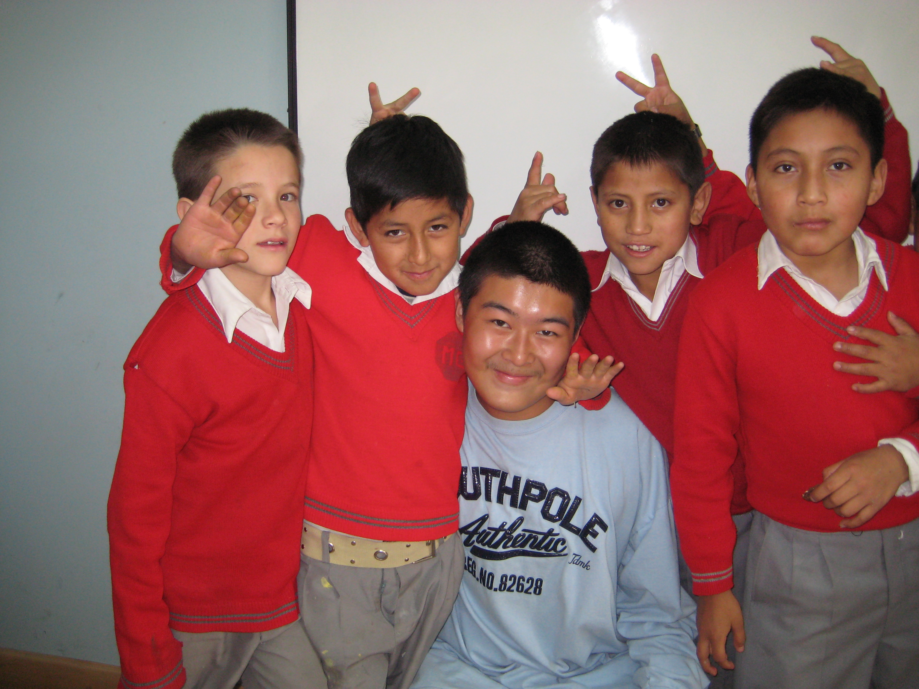 male volunteer with students