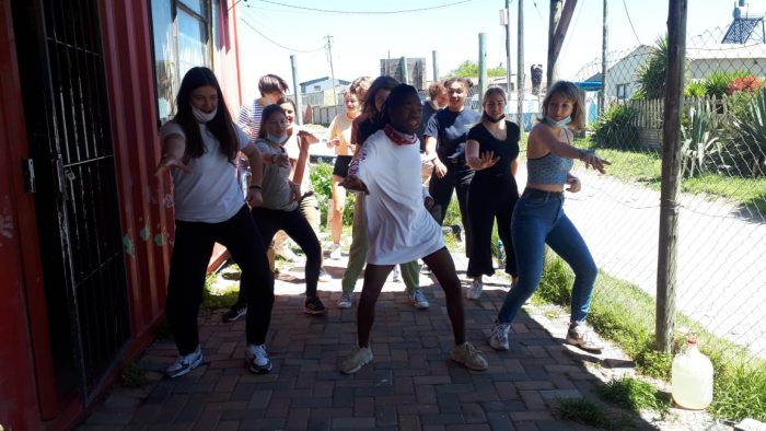 volunteers dancing outside