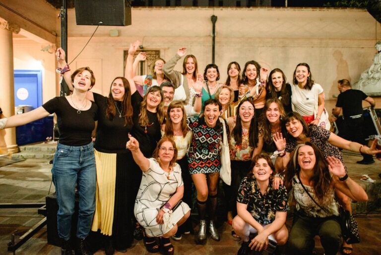 Women from a community empowerment project celebrating together at an event in Córdoba, Argentina