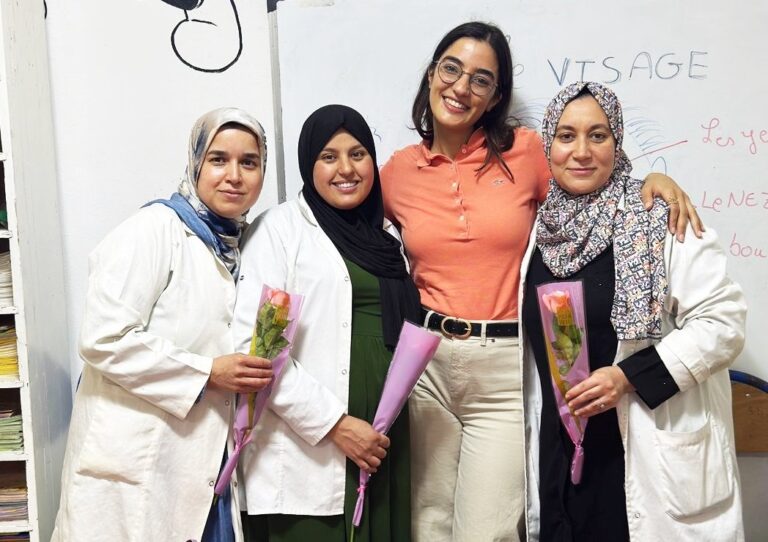 Volunteer with local teaching staff at a women's education centre in Rabat, Morocco