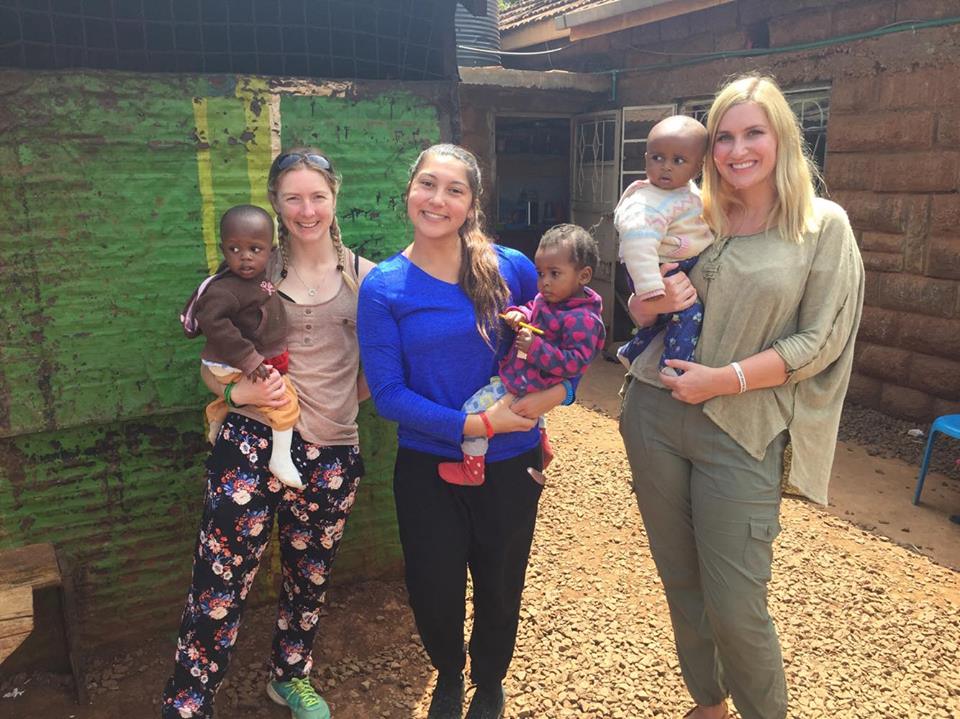 Volunteers with children in Kenya